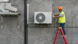 Technician checking out the HVAC unit
